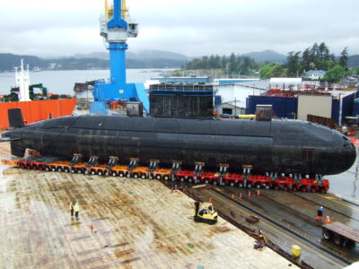 HMCS Chicoutimi - After the hmcs chicoutimi suffered an internal fire in halifax, it was transported through the panama canal to the victoria graving dock, where a building was erected in order to totally restore the internal of the vessel for the canadian navy.