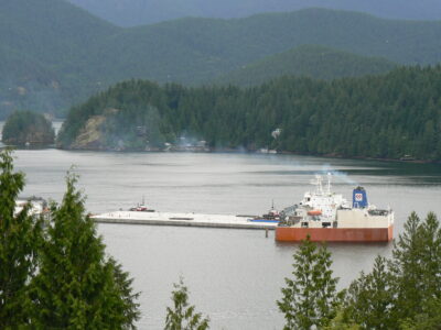 Highway Section - Remnants of seattle interstate I90 floating bridge were towed to vancouver for loading aboard a dockwise semi-submersible vessel for transport to southern california’s new part of port of los angeles.